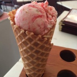 Pink ice cream in a cone